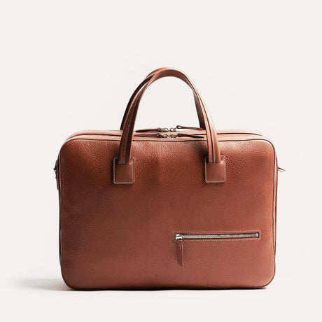 https://www.lundi-paris.com/cdn/shop/files/TIL3-sac-ordinateur-de-voyage-Tilio-en-cuir-pour-homme-cognac-10.jpg