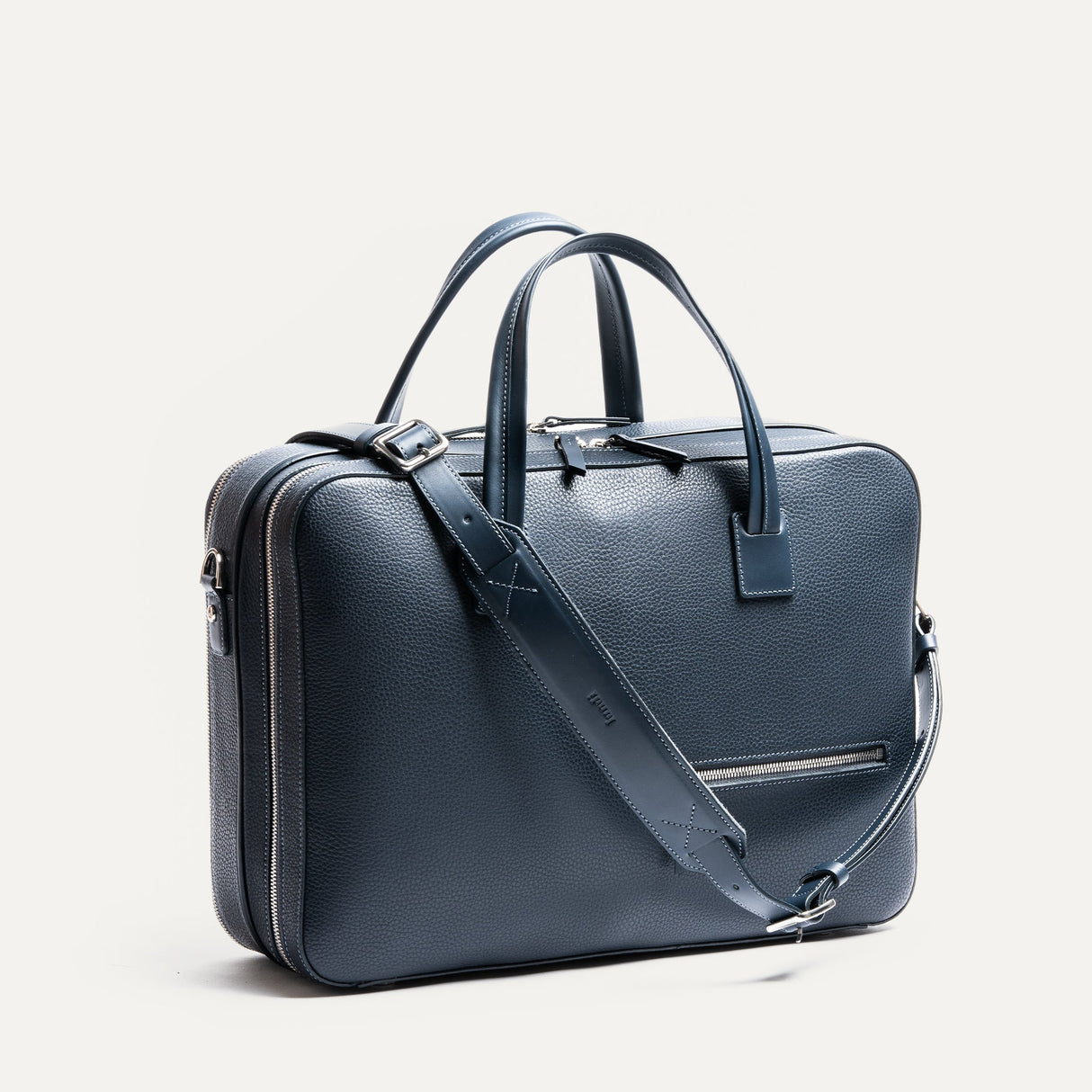 https://www.lundi-paris.com/cdn/shop/files/TIL4-sac-ordinateur-de-voyage-Tilio-en-cuir-pour-homme-marine-11.jpg